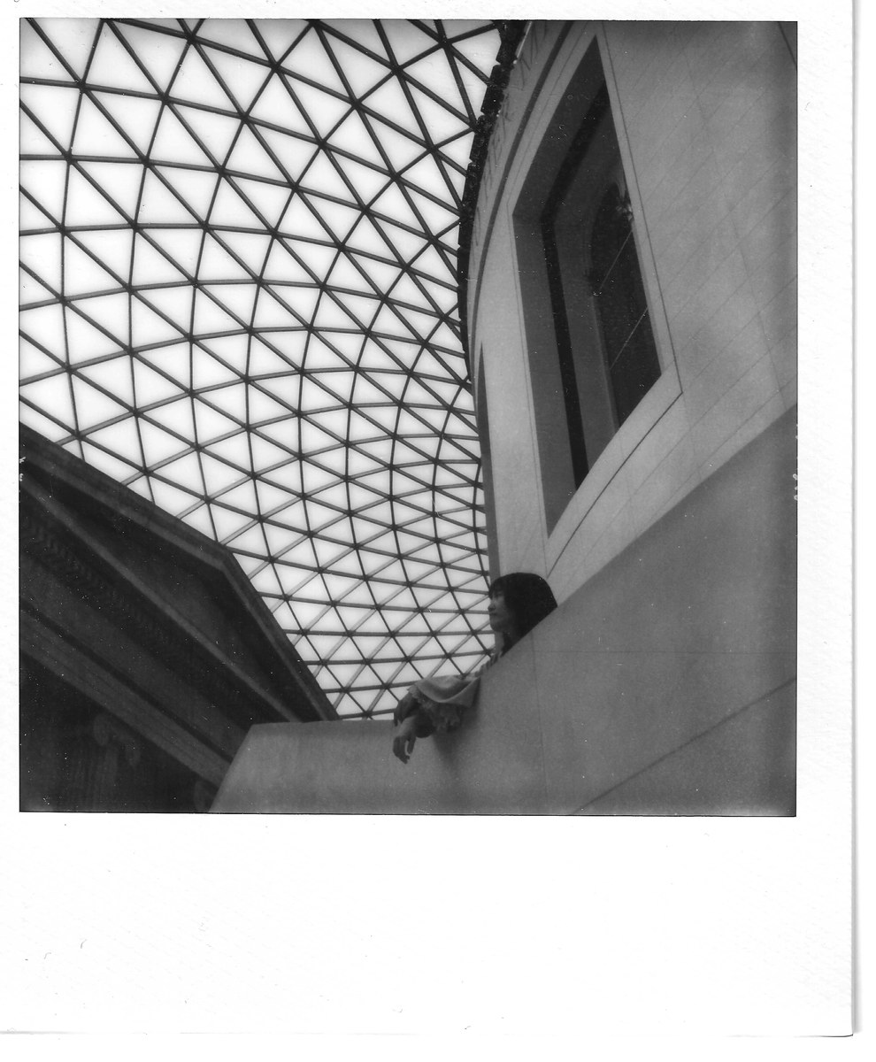 museum roof lattice, figure on the parapet